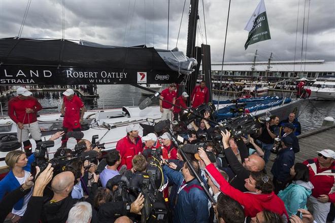 Media scrum around Bob Oatley amd Mark Richards after Wild Oats XI’s 2014 Rolex Sydney Hobart win © Carlo Borlenghi / Rolex