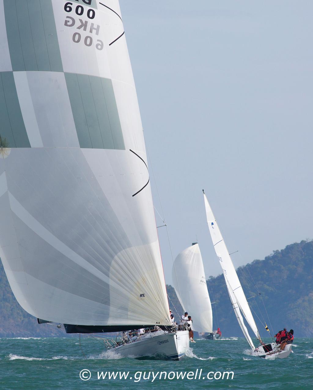 Little and large. Jelik takes on a mighty Platu. Royal Langkawi International Regatta 2016. © Guy Nowell http://www.guynowell.com