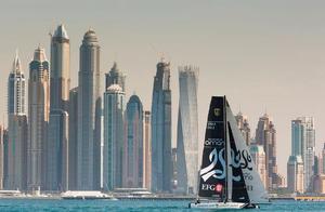 Oman Air sail against the backdrop of the Dubai skyline on the first day of training photo copyright Lloyd Images taken at  and featuring the  class