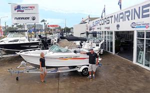Emma Brown (Expo) and Paul Banning (Surf Coast Marine) showing off the fully equipped, ready-to-go boating package that will get you, your family and friends safely out on the water and immediately making memories photo copyright Gold Coast Marine Expo www.gcmarineexpo.com.au taken at  and featuring the  class