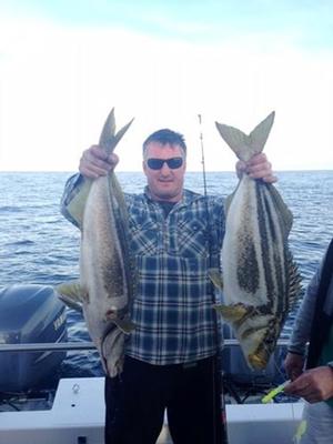 Stuart Blackwall with  striped Trumpeter....Mussleroe Charters. photo copyright Carl Hyland taken at  and featuring the  class