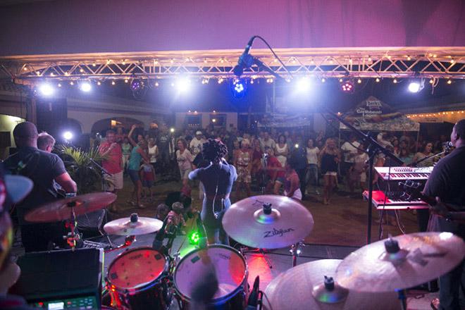 Asha Otto & Itchy Feet playing to hundreds of party goers at Jolly Harbour.  © Jack Prendergast