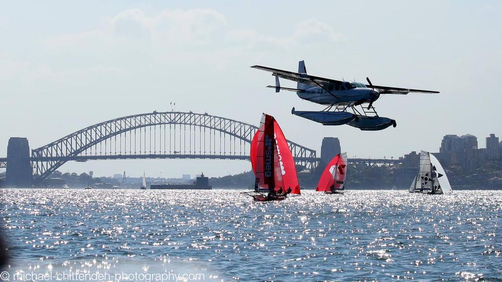 A sea plane attempts to set down in the race fleet - Race 5 - JJ Giltinan Trophy © Michael Chittenden 