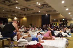 Guests at the Sheraton Hotel in Nadi are evacuated to the ballroom in the midst of Cyclone Winston. photo copyright abc.net.au taken at  and featuring the  class