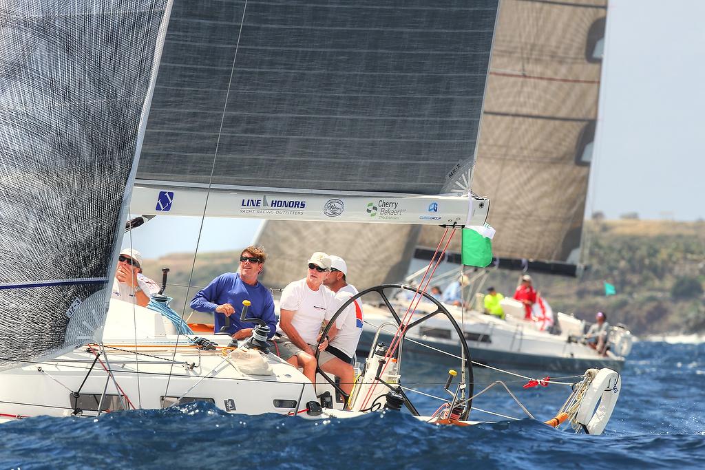 The team on the Melges 24, Island Water World, sails Round the Rocks with St. Maarten's Frits Bus at the helm. Credit: Ingrid Abery - St. Thomas International Regatta © Ingrid Abery http://www.ingridabery.com