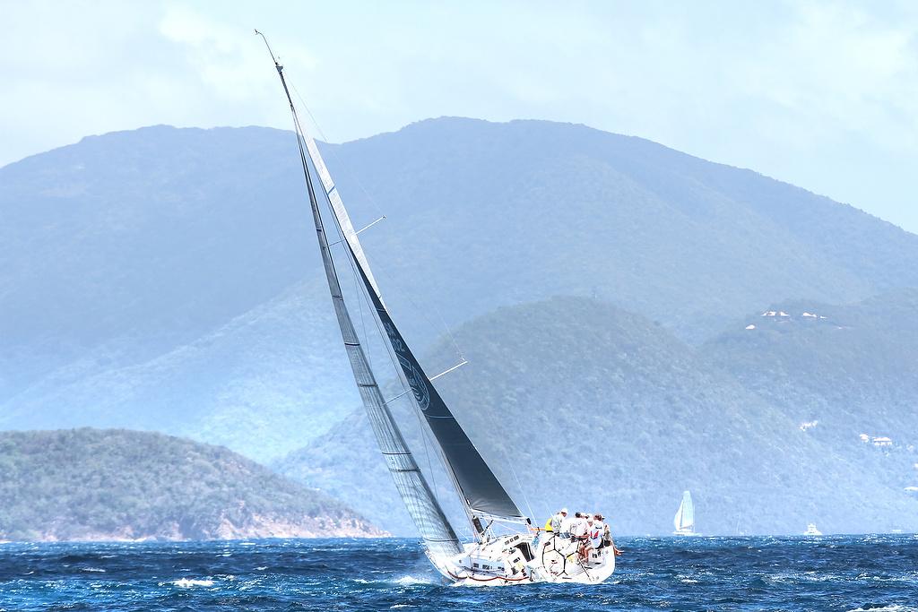 The majestic background of St. John, site of the Virgin Islands National Park, provides a spectacular backdrop for the Round the Rocks Race. Credit: Ingrid Abery - St. Thomas International Regatta © Ingrid Abery http://www.ingridabery.com