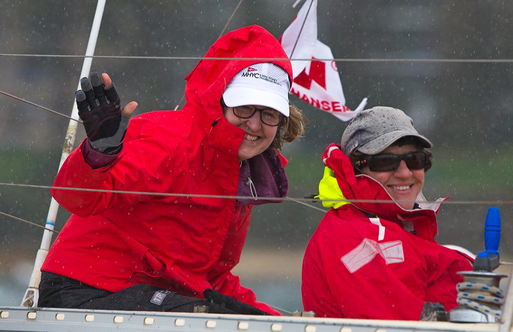 Smiling through the rain. © Crosbie Lorimer http://www.crosbielorimer.com