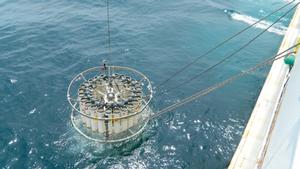 A rosette sampler carrying 24 empty Niskin bottles is deployed into the Pacific to collect samples of water after the Fukushima nuclear accident. photo copyright Woods Hole Oceanographic Institution (WHOI) http://www.whoi.edu/ taken at  and featuring the  class