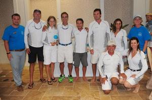 Renato Cunha Faria helmed his Dufour 500 Ventaneiro 3 to victory in CSA Cruising with his Brazilian team photo copyright Todd VanSickle / BVI Spring Regatta http://www.bvispringregatta.org taken at  and featuring the  class