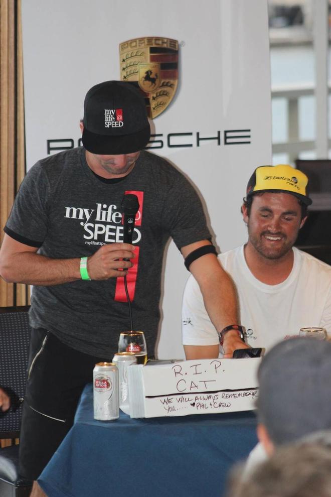 Not quite sure what is happening here - Phil Robertson despatches a cat, while Chris Steele looks on. © Long Beach Yacht Club http://www.lbyc.org