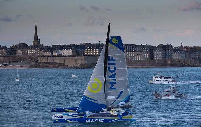 Macif sails over the warm up start line. - 2016 Transat Bakerly  © Lloyd Images http://lloydimagesgallery.photoshelter.com/