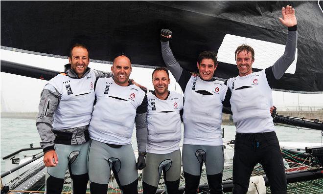 The crew of Alinghi, skippered by Arnaud Psarofaghis, celebrate their Act win on board their GC32 in Qingdao. &copy; Aitor Alcalde Colomer