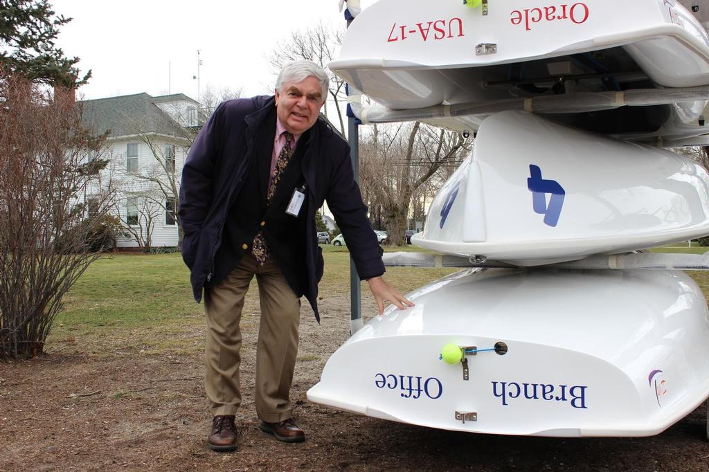 Head of School and avid sailor Peter Branch inspects a vessel named by his wife in honor of him.  - Rocky Hill School to Christen Seven New Sailboats © Peter Hanney