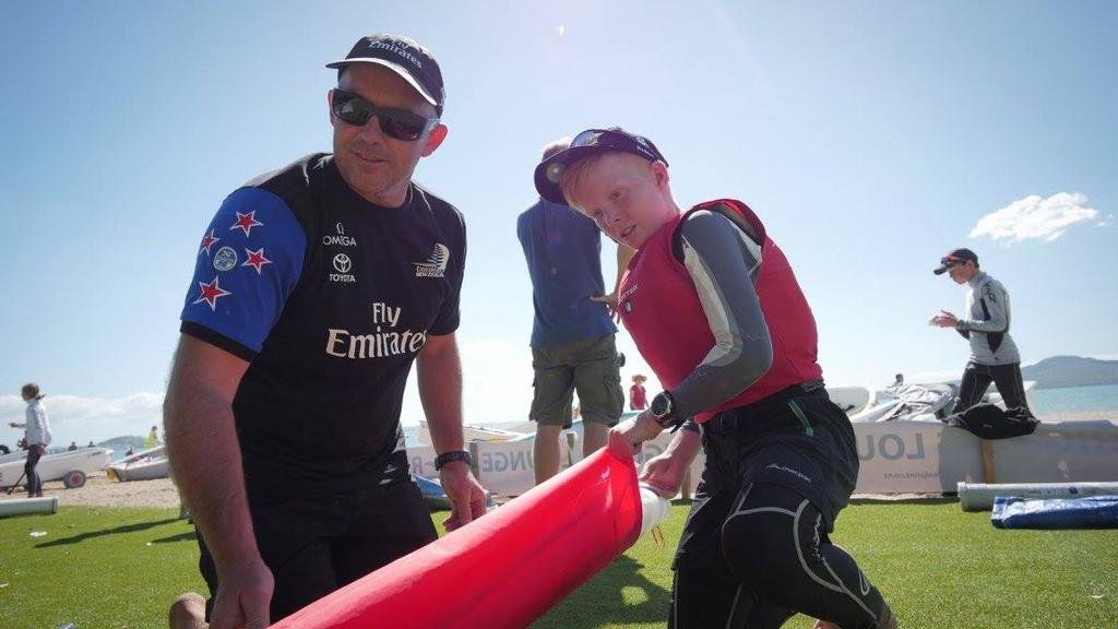 Emirates Team New Zealand's Ray Davies helps pack a sail - Emirates Team NZ at the Toyota NZ Optimist Nationals © Hamish Hooper/Emirates Team NZ http://www.etnzblog.com