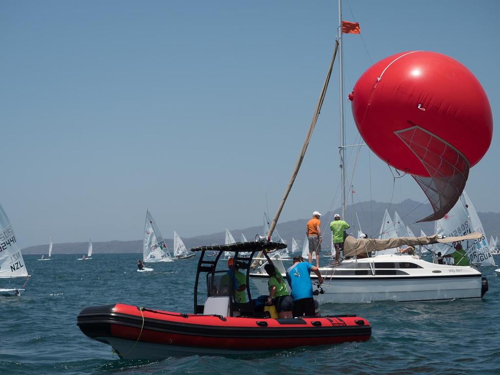 Launching the starting camera balloon - Day 7, 2016 Laser Radial World Championships, Mexico photo copyright JLDigitalMedia http://jldigitalmedia.zenfolio.com/ taken at  and featuring the  class