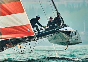 Red Bull Sailing Team's Roman Hagara at the helm during the second day's racing in Qingdao, China photo copyright Aitor Alcalde Colomer taken at  and featuring the  class