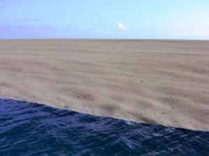 It looks like a beach in the middle of the ocean! photo copyright www.afloat.ie taken at  and featuring the  class