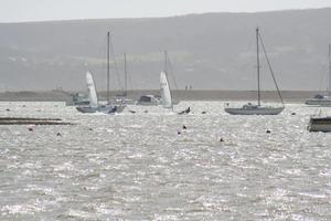 Nev and Peter neck and neck towards Hurst and the 37kn peak gust! photo copyright Neil Hardie taken at  and featuring the  class
