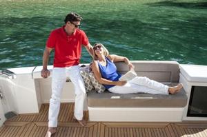 The 575's innovative cockpit layout creates an entirely new indoor/outdoor experience, including transom seat and storage, wet bar with twin BBQ, fridge and ice-maker. photo copyright Riviera Australia taken at  and featuring the  class