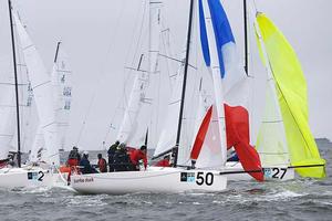 J/70 races commonly see boats rounding marks within a few tenths of a second, as Bodo & Nick von der Wense’s J/70 Turbo Duck shows perfectly at the top mark rounding of Race 2 today. photo copyright Tim Wilkes taken at  and featuring the  class