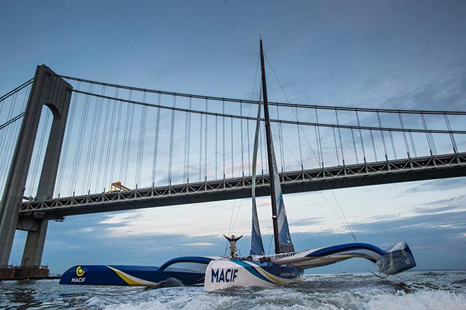 Francois Gabart on board his MACIF ‘Ultim’ 105ft trimaran, shown here celebrating after winning the 'Transat Bakerley' solo transatlantic yacht race. © Lloyd Images