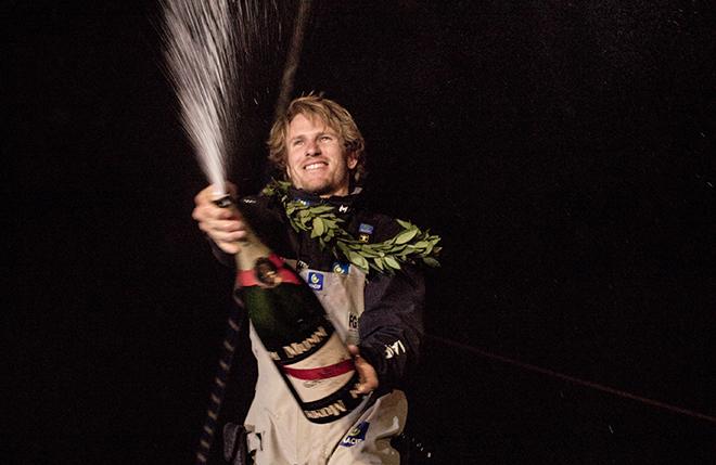 Francois Gabart on board his MACIF ‘Ultim’ 105ft trimaran, shown here celebrating after winning the 'Transat Bakerley' solo transatlantic yacht race. © Lloyd Images