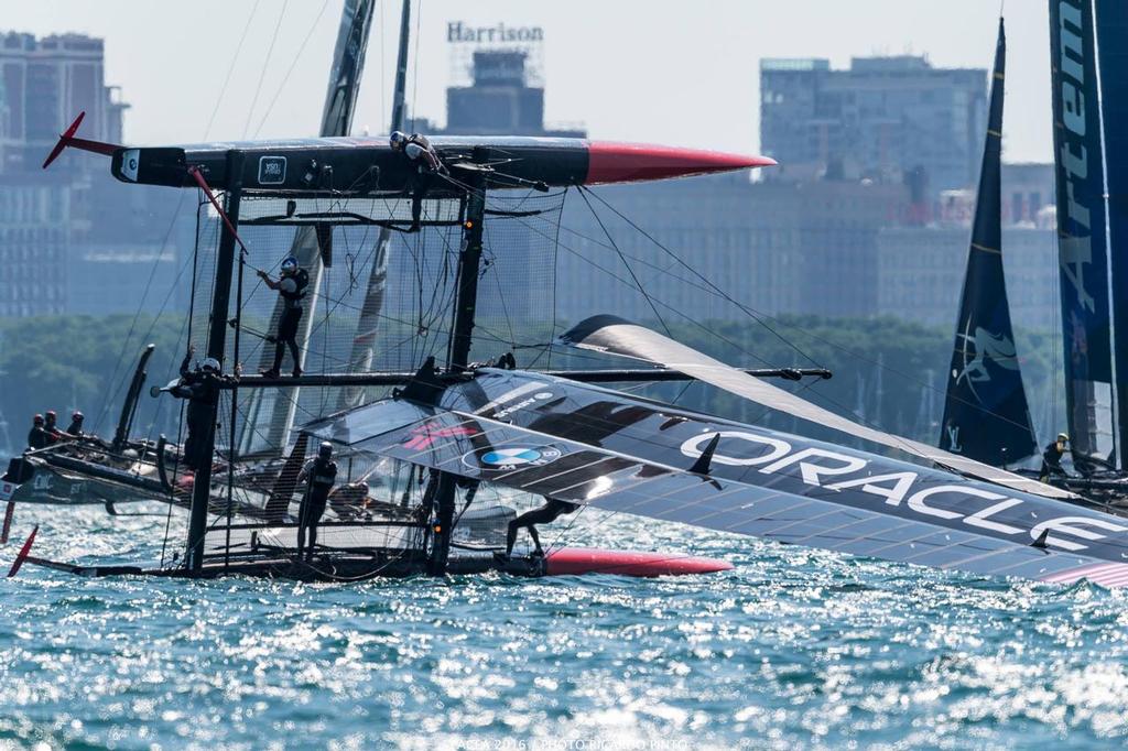 Oracle Team USA capsizes to windward of Artemis Racing - Louis Vuitton America's Cup World Series Chicago - Practice Day © Americas Cup Media www.americascup.com