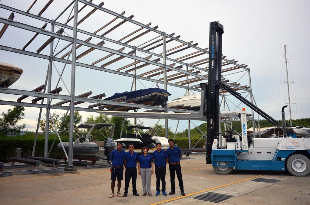 Royal Phuket Marina expand with new Dry Stack and latest lift technology from the USA. Pictured: Mrs. Woranart Wongvanich, Marina Manager at Royal Phuket Marina (centre) and the marina team. - Royal Phuket Marina © Event Media