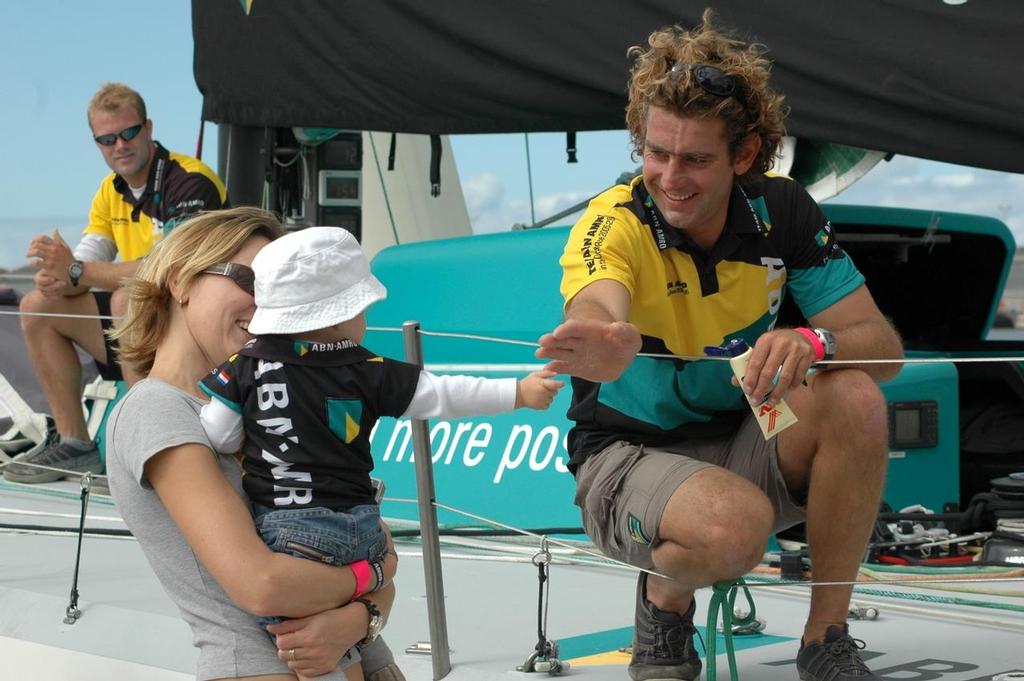Helmsman Hans Horrevoets chats with his child from the deck of  ABN AMRO TWO before the start of the Melbourne In Port Race photo copyright Volvo Ocean Race www.volvooceanrace.com taken at  and featuring the  class