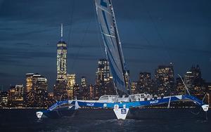 Francois Gabart on board his MACIF ‘Ultim’ 105ft trimaran, shown here celebrating after winning the 'Transat Bakerley' solo transatlantic yacht race. photo copyright Lloyd Images taken at  and featuring the  class