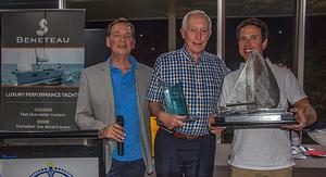 Barry Jackson collects some of the goodies for Alibi’s win in the Spinnaker Division. - 2016 Beneteau Pittwater Cup photo copyright  John Curnow taken at  and featuring the  class