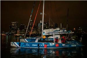 Pierre Antoine celebrates his podium position - The Transat bakerly photo copyright Amory Ross http://www.amoryross.com taken at  and featuring the  class