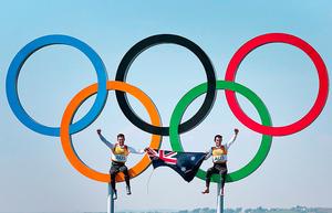 Celebrating their Gold Medal win, Malcolm Page and Mat Belcher. photo copyright  Victor Kovalenko taken at  and featuring the  class