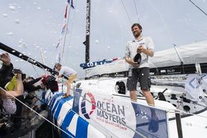 Imoca SMA, skipper Paul Meilhat (FRA), fourth place celebration with champagne, during the arrival - 2016 New York–Vendée Transatlantic Race photo copyright Olivier Blanchet / DPPI / SMA taken at  and featuring the  class