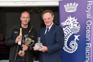 Stuart Sawyer's, Black Dog wins the J/111Class presented by RORC Commodore Michael Boyd.  - 2016 RORC Vice Admiral's Cup photo copyright Rick Tomlinson / RORC taken at  and featuring the  class