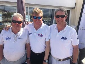 The winning crew of 'Xcellent' (GBR) Bob Smith, John Pollard, and Steve Proctor photo copyright Helen Fretter taken at  and featuring the  class