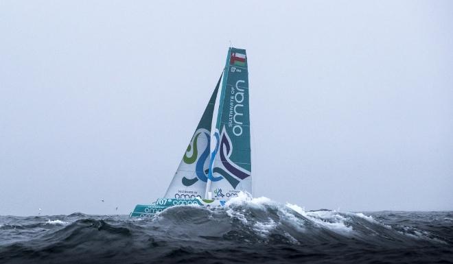 'Musandam' the Sultanate of Oman MOD70 trimaran passing 'Bull Rock' at sunrise this morning. Skippered by Sidney Gavignet (FRA) with team mates Damian Foxall (IRL) and Fahad Al Hasni (OMA), Jean Luc Nelias (FRA), Yasir Al Rahbi (OMA) and Sami Al Sukaili (OMA) - 2016 Volvo Round Ireland Race © Lloyd Images