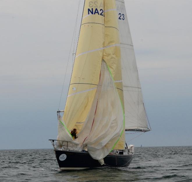 Sunday, the day after this photo was taken, saw winds up to 30knt. It was a rough day for the US Naval Academy's 'Defiance' NA23. She was dismasted in a collision with 
