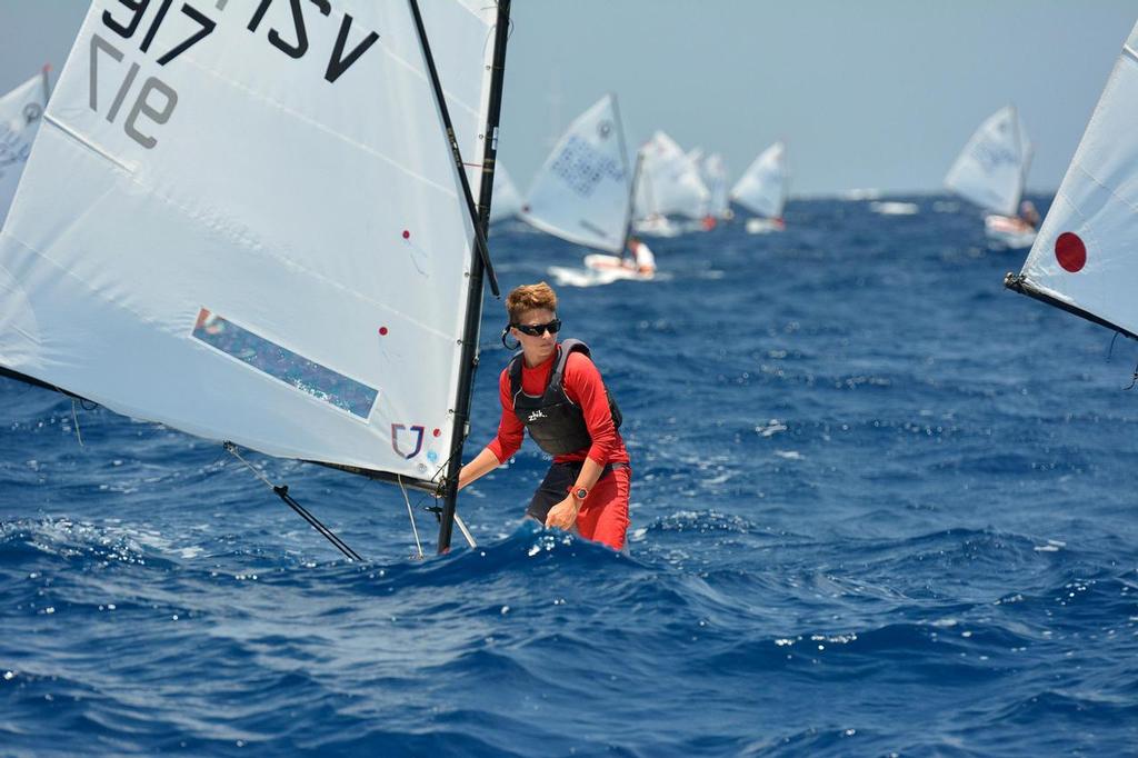 St. John, USVI’s Mateo DiBlasi looks like he’s walking on water in the steep waves. Credit: Dean Barnes © Dean Barnes