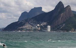 A surfer is seen at Ipanema beach in Rio de Janeiro, Brazil, June 9, 2016. photo copyright Reuters / Sergio Moraes taken at  and featuring the  class