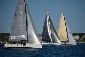 Crazy Horse, a JV50 skippered by Kevin McLaughlin (in middle) is among the top four on elapsed time for the St David's Lighthouse division photo copyright Barry Pickthall / PPL taken at  and featuring the  class