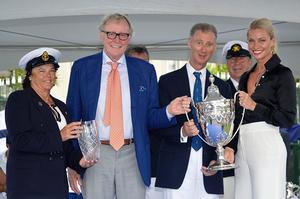 Jim and Kristy Hinze Clark, owners of COMANCHE, presented with the Royal Mail trophy for first tin the Open Division, by His Excellency, The Governor of Bermuda, Geroge Fergusson  and Leatrice Oatley, Commodore of the Royal Bermuda YC. photo copyright Barry Pickthall / PPL taken at  and featuring the  class