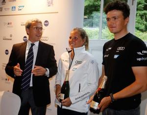 Dr. Carsten Krage, Chairman of Kiel Yacht Club, congratulated with champagne from Moët on the occasion of pressconference for Kiel Week Nacra17 sailors Carolina Werner and Paul Kohlhoff (from left) to win the silver medal at the Worldcup in Weymouth. The Duo from Kiel could hope now to be nominated for Olympic Games photo copyright okpress taken at  and featuring the  class