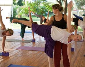 Assisted ardha chandrasana at Healthy Options photo copyright WildWind http://www.wildwind.co.uk/ taken at  and featuring the  class