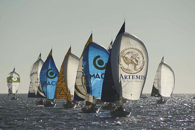 Downwind in the sunshine. Will Harris with his Artemis spinnaker out front. &copy; Artemis Offshore Academy