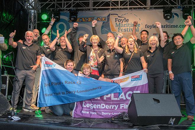The Clipper Telemed crew celebrate third place in the New York to Derry-Londonderry transatlantic race and received their award at the Clipper Race LegenDerry Finale in Guildhall Square. © Martin McKeown, Clipper Race