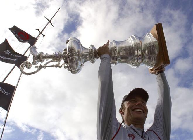 Ernesto Bertarelli (SUI) holds the America’s Cup aloft in 2007 © Herreshoff Marine Museum . http://www.herreshoff.org