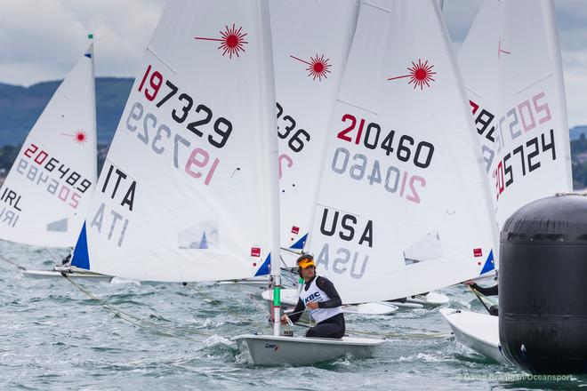 Italy's Alessando Angelini competing in the opening race of the KBC Laser Radial World Championships being hosted by the Royal St. George Yacht Club and Dun Laoghaire Harbour. © David Branigan - Oceansport.ie