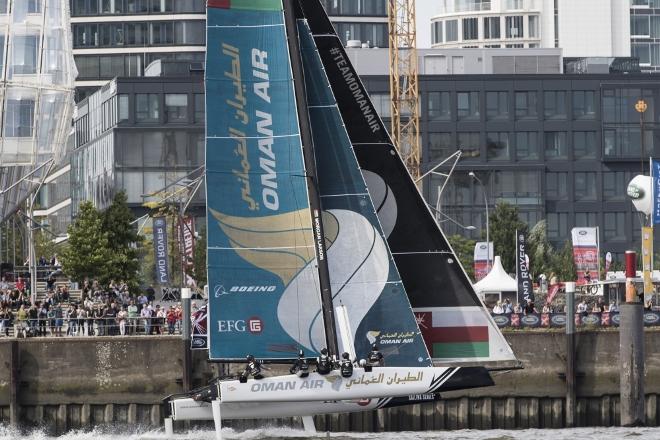 The Extreme Sailing Series. Act 4. Hamburg. Germany. 29th July 2016. Picture of Oman Sail skippered by Morgan Larson in action on day two of racing today © Lloyd Images