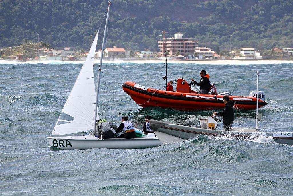 Repairs on the Brazilian 470 Pre-start photo copyright Richard Gladwell www.photosport.co.nz taken at  and featuring the  class